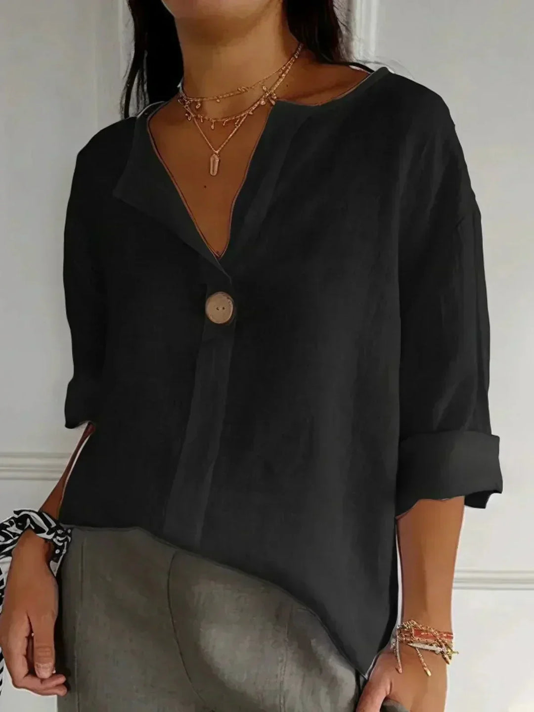 AVA | Blusa holgada con Cuello en V