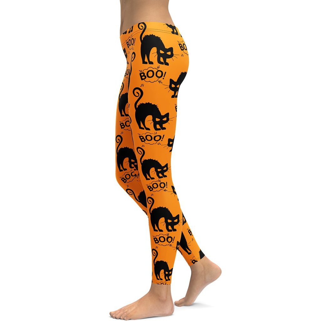 Leggings de Halloween Gatitos Negros con estampado de gatos negros sobre fondo naranja – imagen 1
